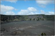 Kilauea Iki crater. There are people hiking the trail, for scale.